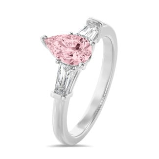 1.00 carat trilogy ring in white gold with pink lab grown pear diamond and lab grown tapered baguettes