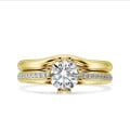 1.00 carat solitaire diamond ring in yellow gold with side diamonds