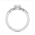 1.00 carat solitaire cluster ring in white gold with oval diamond