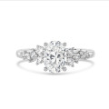 1.00 carat solitaire cluster ring in white gold with oval diamond