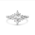 1.00 carat solitaire cluster ring in white gold with marquise diamond