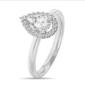 5.00 carat solitaire halo ring with pear diamond in white gold with round diamonds