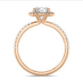 5.00 carat solitaire halo ring in red gold with round diamonds