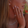 2.00 carat solitaire earrings with round diamonds in yellow gold