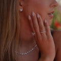 2.00 carat solitaire earrings with round diamonds in red gold