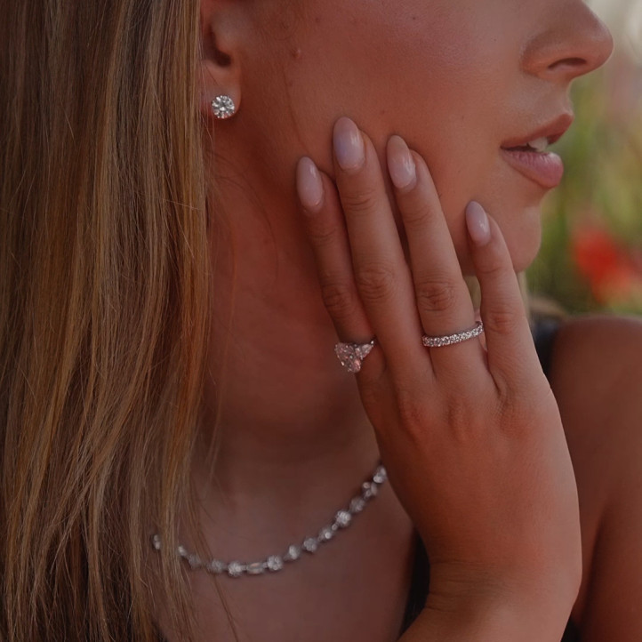 3.00 carat solitaire earrings with round diamonds in red gold