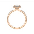 2.50 carat solitaire halo ring with a asscher cut diamond in red gold and round diamonds
