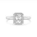 2.00 carat solitaire halo ring with a radiant cut diamond in white gold and round diamonds