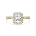 3.00 carat solitaire halo ring with a lab grown radiant cut diamond in yellow gold and round lab grown diamonds