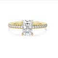 1.00 carat solitaire ring with a lab grown radiant cut diamond in yellow gold and lab grown side diamonds