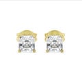 2.00 carat solitaire asscher cut diamond earrings in yellow gold