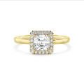 5.00 carat solitaire halo ring with a lab grown asscher cut diamond in yellow gold and round lab grown diamonds