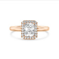 5.00 carat solitaire halo ring with a radiant cut diamond in red gold and round diamonds