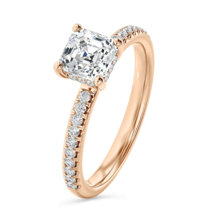 2.50 carat solitaire ring with a lab grown asscher cut diamond and hidden halo in red gold