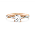 5.00 carat solitaire ring with a lab grown asscher cut diamond and hidden halo in red gold