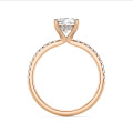 1.00 carat solitaire ring with a cushion diamond and hidden halo in red gold