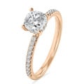 1.00 carat solitaire ring with a lab grown cushion diamond and hidden halo in red gold
