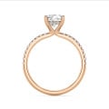 1.00 carat solitaire ring with a lab grown cushion diamond and hidden halo in red gold