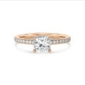 1.00 carat solitaire ring with a lab grown cushion diamond and hidden halo in red gold