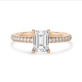 2.50 carat solitaire ring with a lab grown emerald cut diamond and hidden halo in red gold