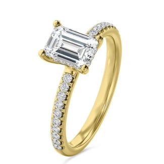 1.20 carat solitaire ring with a lab grown emerald cut diamond and hidden halo in yellow gold