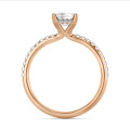 5.00 carat solitaire ring with a emerald cut diamond and hidden halo in red gold