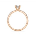 1.00 carat solitaire ring with oval diamond and hidden halo in red gold