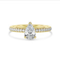 2.00 carat solitaire ring with lab grown pear diamond and hidden halo in yellow gold