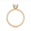 1.50 carat solitaire ring with a radiant cut diamond and hidden halo in red gold