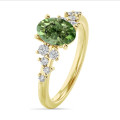 1.00 carat solitaire cluster ring in yellow gold with Fancy Vivid Green oval diamond