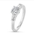 2.00 carat trilogy ring in white gold with a lab grown cushion diamond and lab grown tapered baguettes