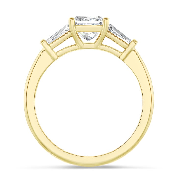 2.00 carat trilogy ring in yellow gold with a lab grown princess diamond and lab grown tapered baguettes