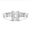2.00 carat trilogy ring in white gold with a lab grown emerald cut diamond and lab gown tapered baguettes