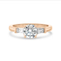 2.00 carat trilogy ring in red gold with round lab grown diamond and lab grown tapered baguettes