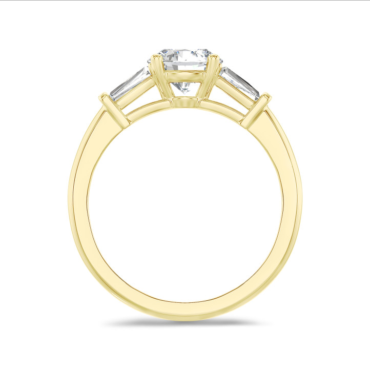 2.00 carat trilogy ring in yellow gold with round lab grown diamond and lab grown tapered baguettes