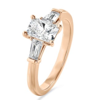 2.00 carat trilogy ring in red gold with a lab grown radiant cut diamond and lab gown tapered baguettes
