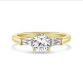 3.00 carat trilogy ring in yellow gold with a lab grown cushion diamond and lab grown tapered baguettes