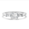 3.00 carat trilogy ring in white gold with a lab grown princess diamond and lab grown tapered baguettes