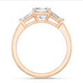 3.00 carat trilogy ring in red gold with a lab grown princess diamond and lab grown tapered baguettes