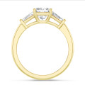 3.00 carat trilogy ring in yellow gold with a lab grown princess diamond and lab grown tapered baguettes
