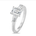 3.00 carat trilogy ring in white gold with a lab grown emerald cut diamond and lab gown tapered baguettes