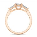 3.00 carat trilogy ring in red gold with lab grown oval diamond and lab grown tapered baguettes