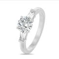 3.00 carat trilogy ring in white gold with round lab grown diamond and lab grown tapered baguettes