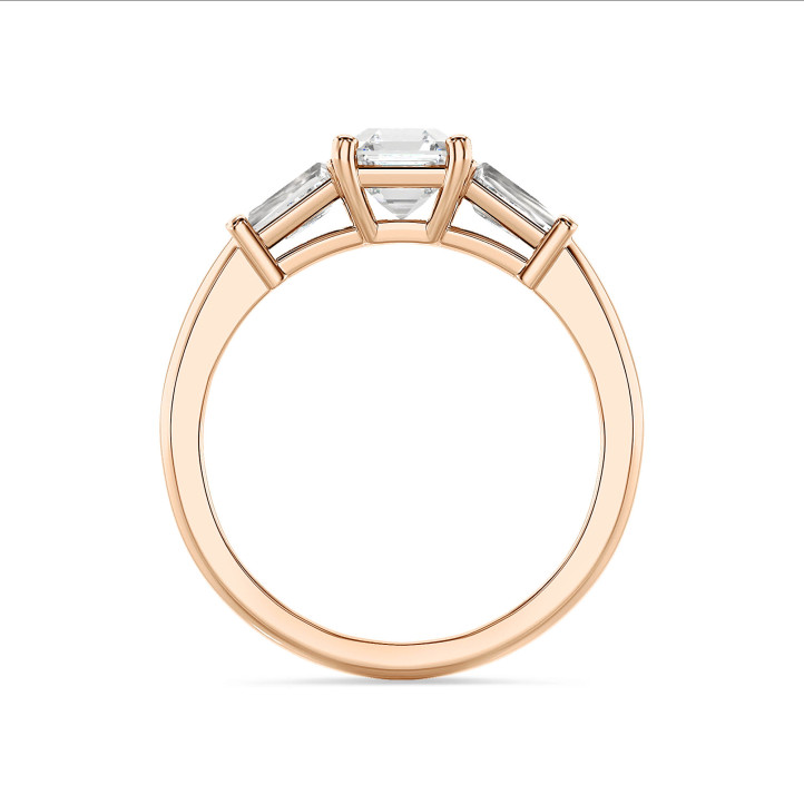 3.00 carat trilogy ring in red gold with a lab grown asscher cut diamond and lab grown tapered baguettes
