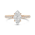 3.00 carat solitaire ring with marquise diamond in red gold with side diamonds