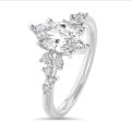 1.50 carat solitaire cluster ring in white gold with marquise diamond