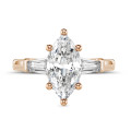 1.00 carat trilogy ring in red gold with lab grown marquise diamond and lab grown tapered baguettes