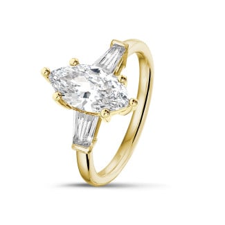 2.00 carat trilogy ring in yellow gold with lab grown marquise diamond and lab grown tapered baguettes