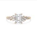 2.00 carat solitaire cluster ring in yellow gold with an emerald cut diamond
