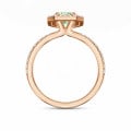 1.20 carat double halo ring with a lab grown Fancy-Vivid Green radiant cut diamond in red gold